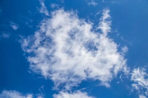 Image of white the clouds on blue sky in the sunny day Stock Photos