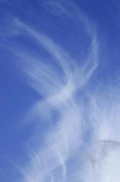 Image of white clouds with blue sky in the background Stock Photos