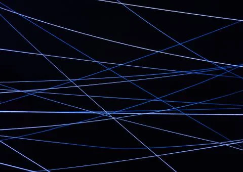 Image of white threads tangled in ultraviolet light Stock Photos