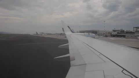 Image from a window of a plane in flight, sky and clouds Stockbeeldmateriaal 109549715