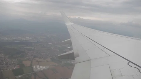 Image from a window of a plane in flight, sky and clouds Stockbeeldmateriaal 109549732