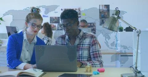 Image of world map over diverse business people Stock Photos