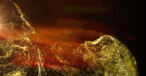 Image of yellow particle cloud and orange light moving on black background Stock Illustration