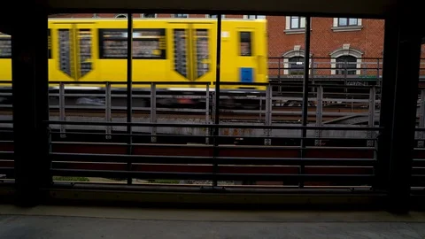 Image of a yellow tram passing in front of brick building, Berlin, Germany. Stock-Footage 105589031