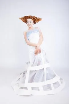 Image of a young beautiful red-haired woman. Young woman with an unusual Stock Photos