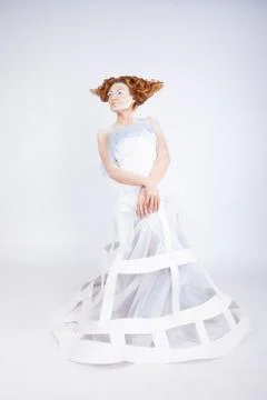 Image of a young beautiful red-haired woman. Young woman with an unusual Stock Photos