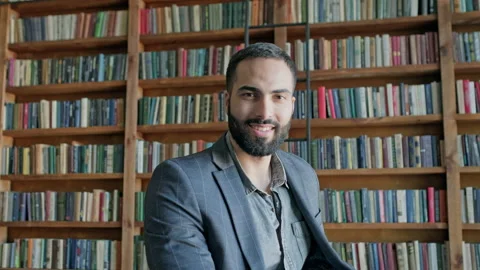 Image Of Young Guy From The Middle East In The Library. Stock Footage 139890521