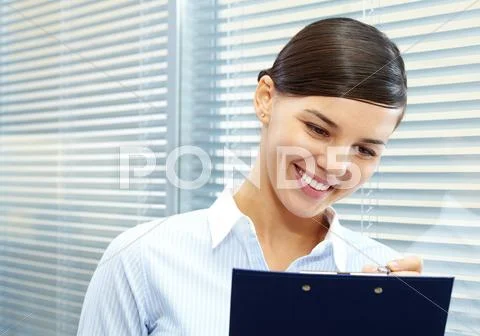 Image of young pretty secretary planning work Stock Photos
