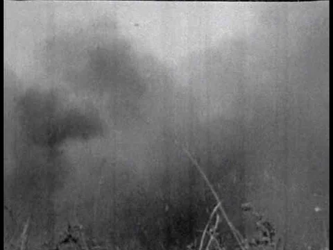 Images of World War Two include bombings, jeeps, tanks and armored vehicles. 動画素材 74777895