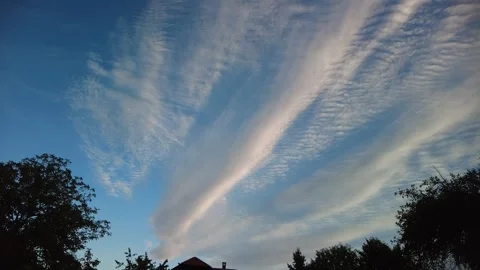 An imaginary ship made of white clouds sails above the roof Stock Footage 273740177