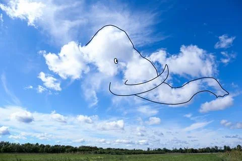 Imagination and creativity. Fluffy cloud in shape of elephant with drawn ou.. Stock Photos