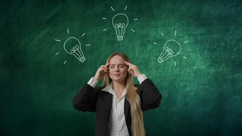 Imagination in problem solving concept. Portrait of woman isolated on green Foto stock