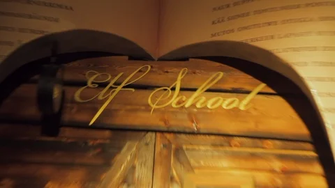 Imaginative text elf school highlight novel writing on a wall, zooming out Stock Footage 111449905