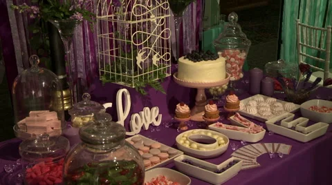 Imaginatively designed table with tasty desserts Stock Footage 43956308