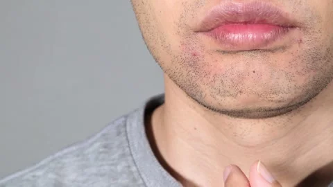 Imagine getting your beard removed for just one coin (a small amount of money). Stock Footage 336617525