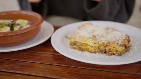 Imagine someone eagerly awaiting a scrumptious meal, featuring pasta and Video stock 303708432