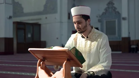 Imam reading Quran mosque Stock Footage 149636690
