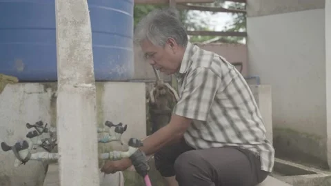 An Imam washing himself Stock Footage 230159713
