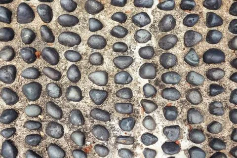 Imbedded pebbles Stock Photos