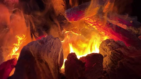 Imitation of a live fire in the fireplace with the help of an air humidifier. Stock-Footage 163716912
