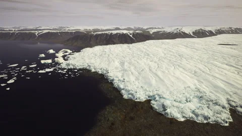 Immense ice formation extending to ocean horizon with textured surface patterns Stock Footage 341826641