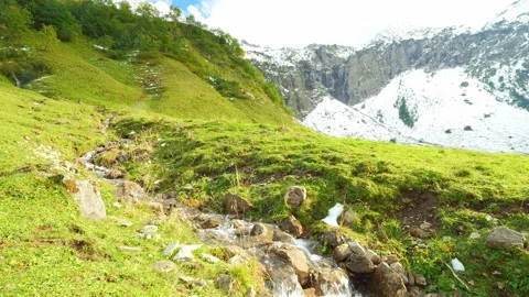 Immerse in Oberstdorfs Natural Charm: Stunning Autumn Views of Oytals Waterfa Video stock 309190624
