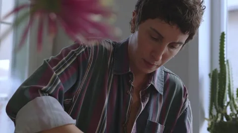 Immerse yourself in the world of empowered creation as the camera zooms in on a Stock Footage 255279521