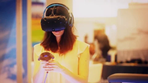Immersed in a virtual reality game Stock Footage 87426375