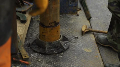 Immersing casing pipe into the borehole Stockbeeldmateriaal 55013579