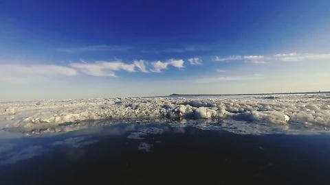 Immersion of the camera in a salt crater filled with water slow motion Stock Footage 108898972