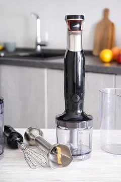 Immersion hand blender on table on a kitchen background. Vertically. Foto stock