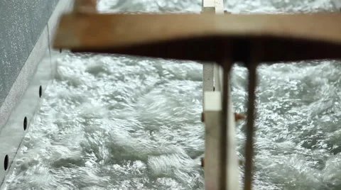 Immersion of a rack in a galvanic bath Stock Footage 68767672