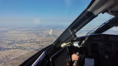 Immersive Jet Cockpit View, with the Captain Hand on the Flight Controls in the Stock Footage 345766764