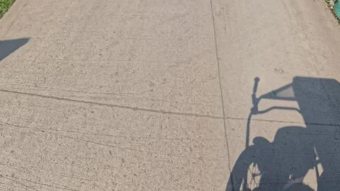 Immersive POV driving shot focused on the texture of a concrete highway Stock Footage 337378016