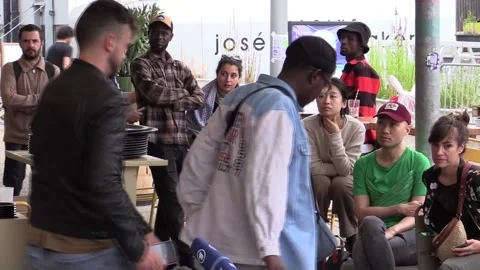 Immigrants affected by Olympic Games denounce that France is not the country of  Stock Footage 279601326