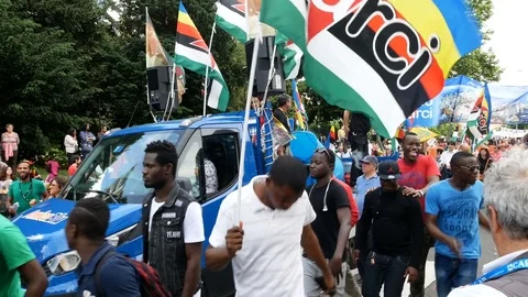 Immigrants dancing during demonstration in Milan, Italy Stock-Footage 76080688