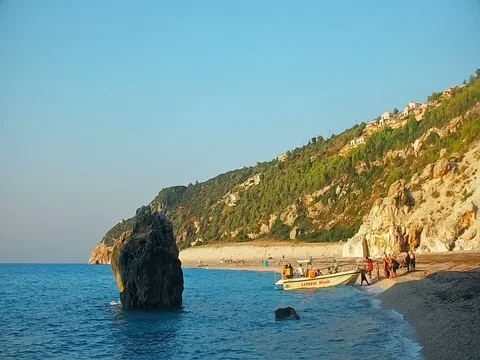 Immigrants embark on a small boat in Greece trying to escape the war Stock Footage 80064562