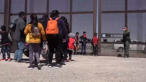 Immigrants at the Wall co Stock Footage 116616884