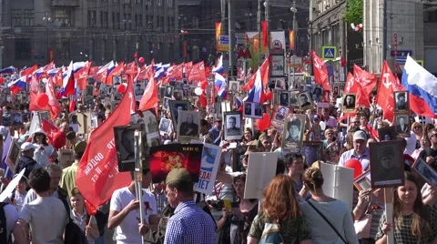 Immortal regiment march in the Victory Day on 9th of May. Marches to commemorate Stock Footage 64766482