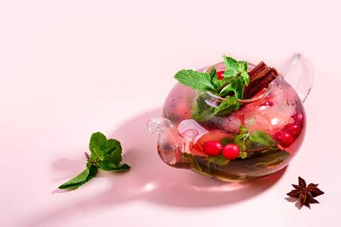 Immunity boosting drink. Mint Tea with cranberries, grapefruit and spices in 写真素材