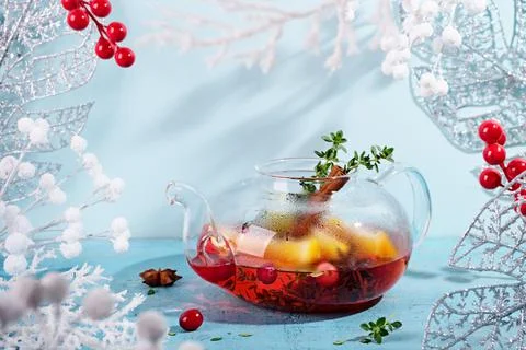 Immunity boosting drink. Winter Tea with cranberries, orange and spices in glass 写真素材