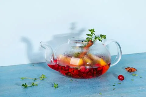 Immunity boosting drink. Winter Tea with cranberries, orange, hibiscus and Fotos Stock