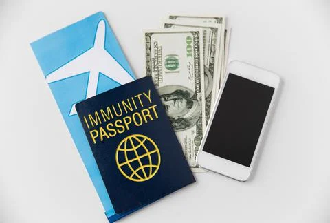 Immunity passport and air tickets for travel Stock Photos