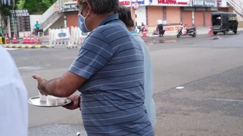 Immunity sharbat is being distributed by an NGO worker Vídeo Stock 246861952