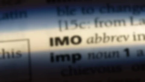 IMO word in a dictionary. Stock Footage 99560861