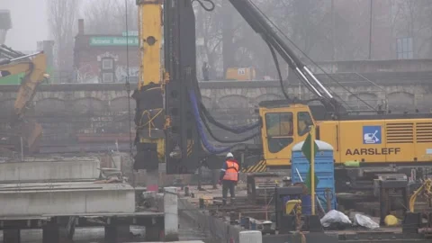 Impact pile driver on board the barge. New bridge construction site. 4359 Stock Footage 147262377