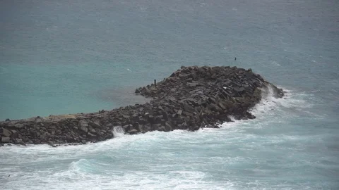 The impact of the waves on the cliffs or shoreline 1 Stock Footage 111257415