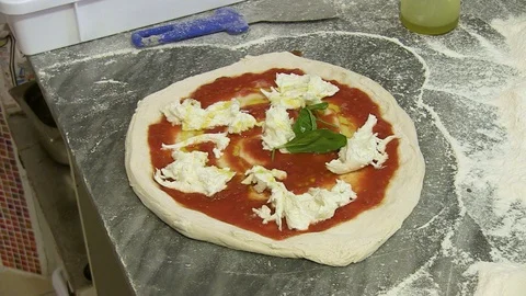 Impale Pizza for Cooking Stock Footage 92549170
