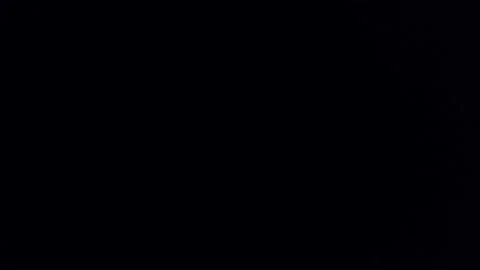 Impassivity, indifference- man motionless while his partner throws his clothes Stock Footage 197763147