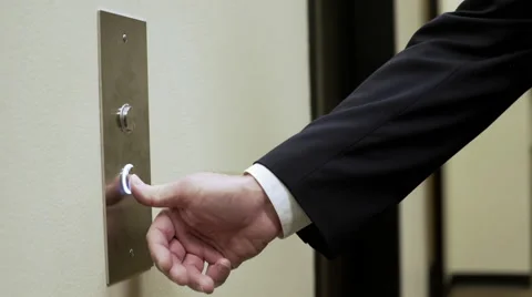 Impatient businessman pressing the elevator button 4k Stock Footage 62746182
